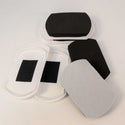 Unpackaged set of 2-In-1 Convertible Furniture Slides, Small (Set of 4) with felt section separated.