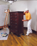Painter moving tall dresser across wood floor with Professional Furniture Slides for Hardwood and Tile (Set of 4)
